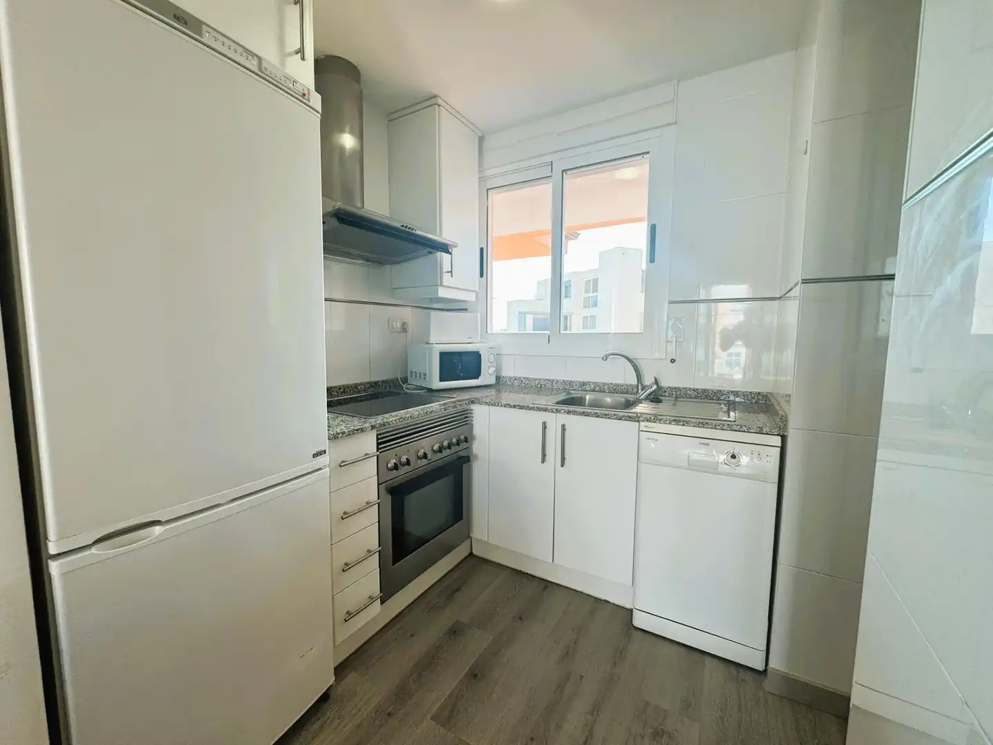 Cuina de Apartament en venda en Dénia amb Aire condicionat, Jardí privat i Terrassa