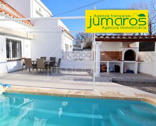 Swimming pool of Single-family semi-detached for sale in Empuriabrava  with Air Conditioner, Heating and Terrace