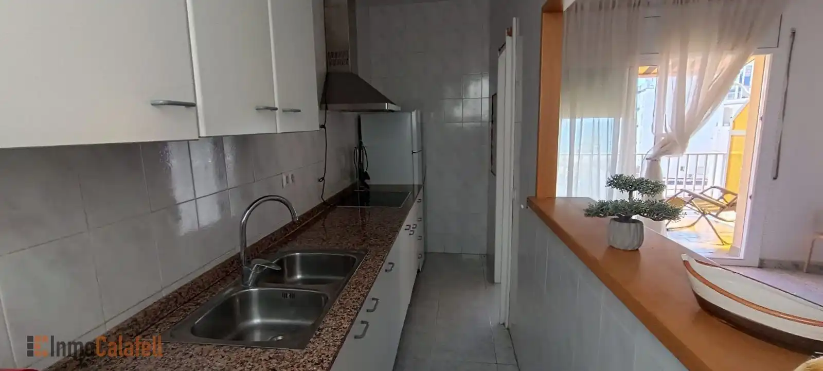 Küche von Dachboden zum Verkauf in Calafell mit Klimaanlage, Heizung und Terrasse