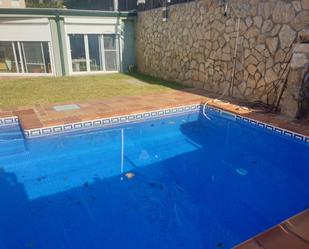 Piscina de Apartament de lloguer en Calafell amb Aire condicionat, Jardí privat i Terrassa