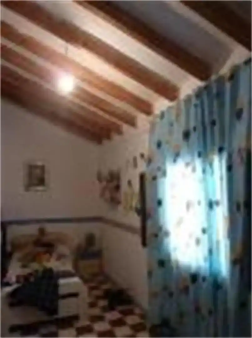 Dormitori de Casa adosada en venda en Comares amb Balcó