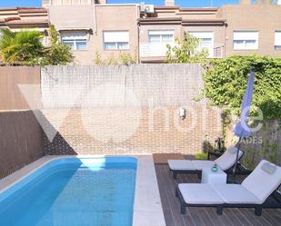 Swimming pool of Single-family semi-detached for sale in  Madrid Capital  with Air Conditioner, Terrace and Swimming Pool