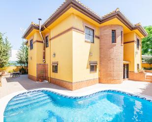 Exterior view of House or chalet for sale in Vegas del Genil  with Air Conditioner, Heating and Private garden