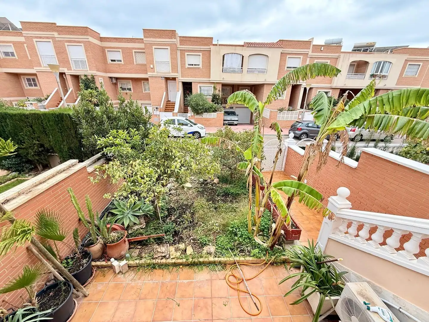 Jardí de Casa adosada en venda en Almería amb Terrassa