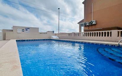 Piscina de Casa adosada en venda en Torrevieja amb Terrassa i Piscina comunitària