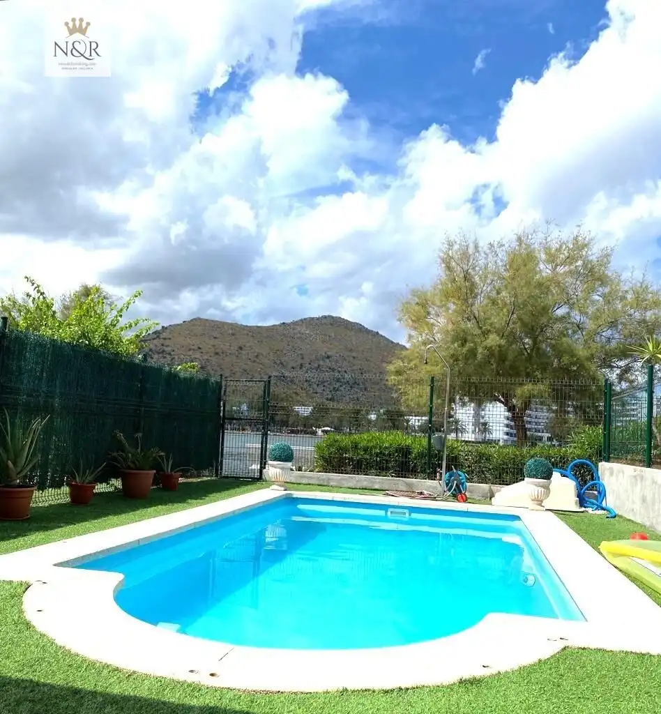 Piscina de Casa adosada de lloguer en Alcúdia amb Aire condicionat, Jardí privat i Terrassa
