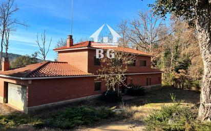 Vista exterior de Casa o xalet en venda en Caldes de Malavella amb Calefacció, Jardí privat i Terrassa