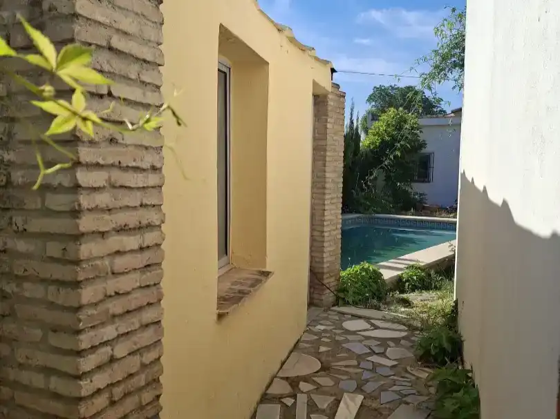 Jardí de Casa adosada en venda en  Sevilla Capital amb Aire condicionat i Piscina