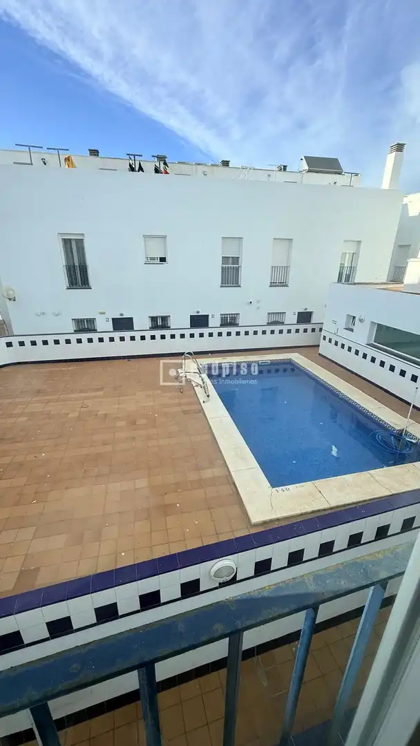 Piscina de Dúplex en venta en Isla Cristina con Calefacción, Terraza y Trastero