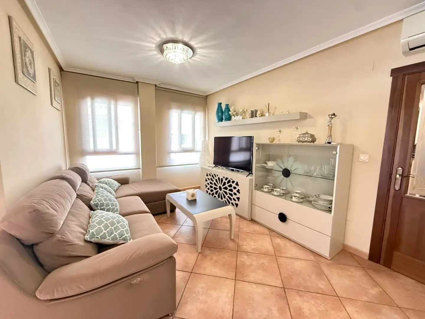 Sala de estar de Casa adosada en venta en Rojales con Aire acondicionado, Terraza y Amueblado
