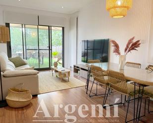 Living room of Planta baja for sale in Palau-solità i Plegamans  with Air Conditioner, Heating and Private garden