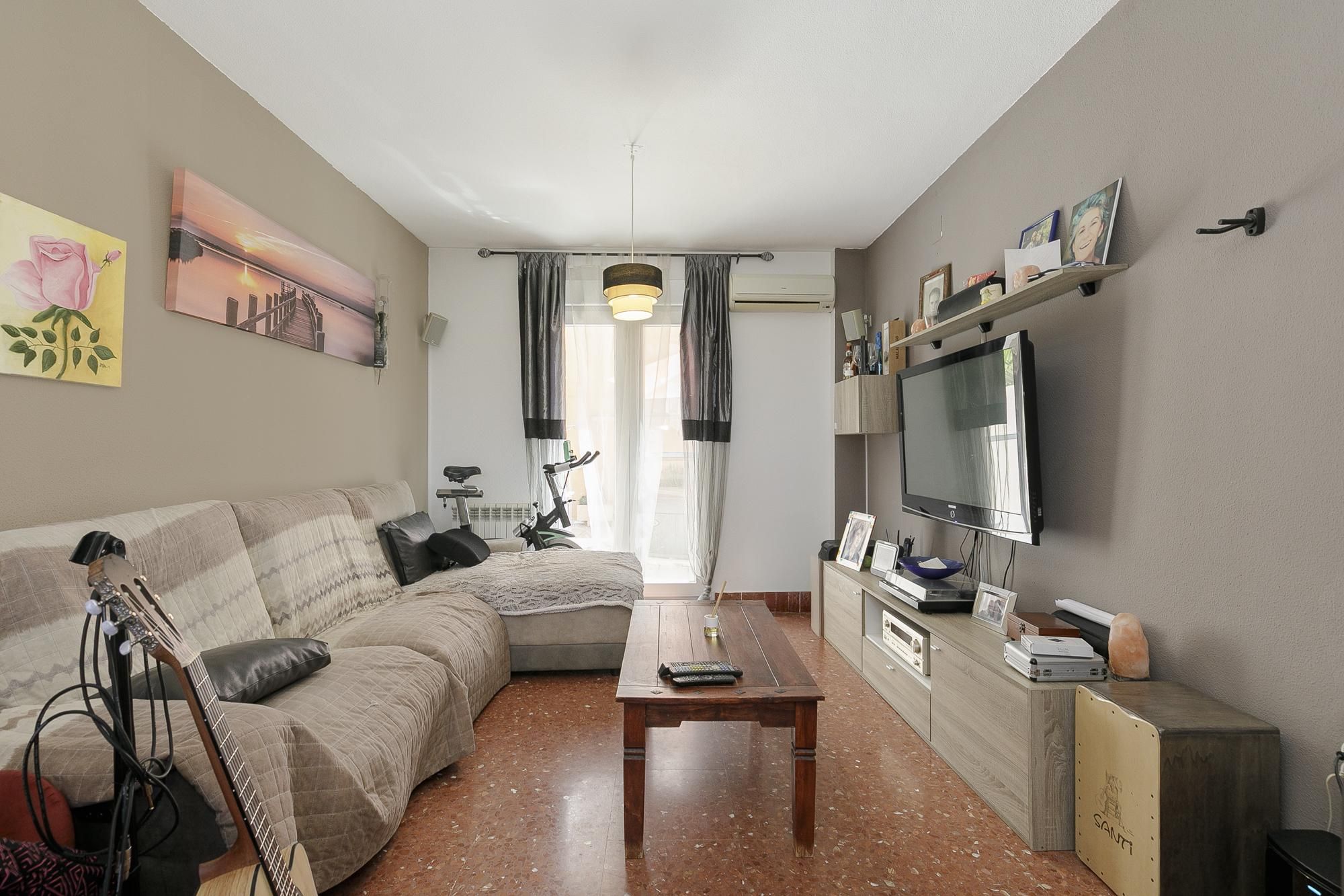 Sala d'estar de Casa adosada en venda en Otura amb Aire condicionat, Calefacció i Terrassa