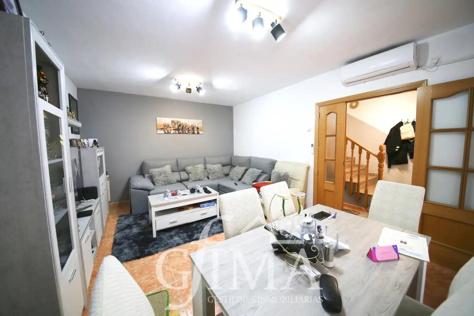 Sala de estar de Casa adosada en venta en Tomelloso con Aire acondicionado, Calefacción y Amueblado