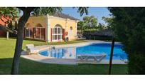 Swimming pool of Duplex for sale in Islantilla