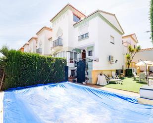 Swimming pool of Single-family semi-detached for sale in Churriana de la Vega  with Air Conditioner, Heating and Storage room