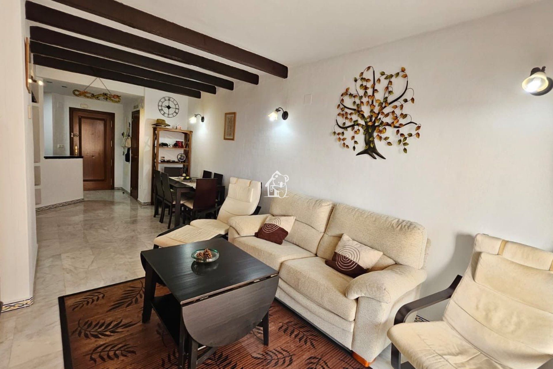 Sala d'estar de Apartament de lloguer en Torrevieja amb Aire condicionat, Jardí privat i Terrassa