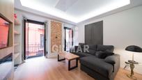 Living room of Flat for sale in  Madrid Capital  with Air Conditioner and Balcony