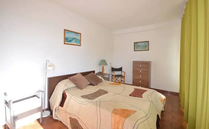 Habitación de Apartamento de alquiler en Llanes con Jardín privado, Terraza y Amueblado