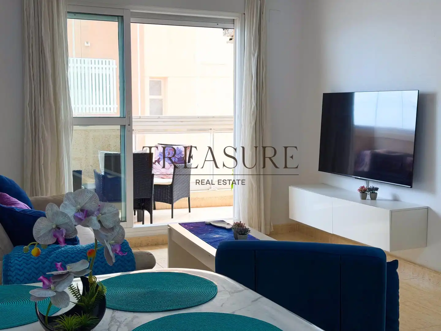 Sala d'estar de Apartament en venda en La Manga del Mar Menor amb Aire condicionat, Terrassa i Moblat