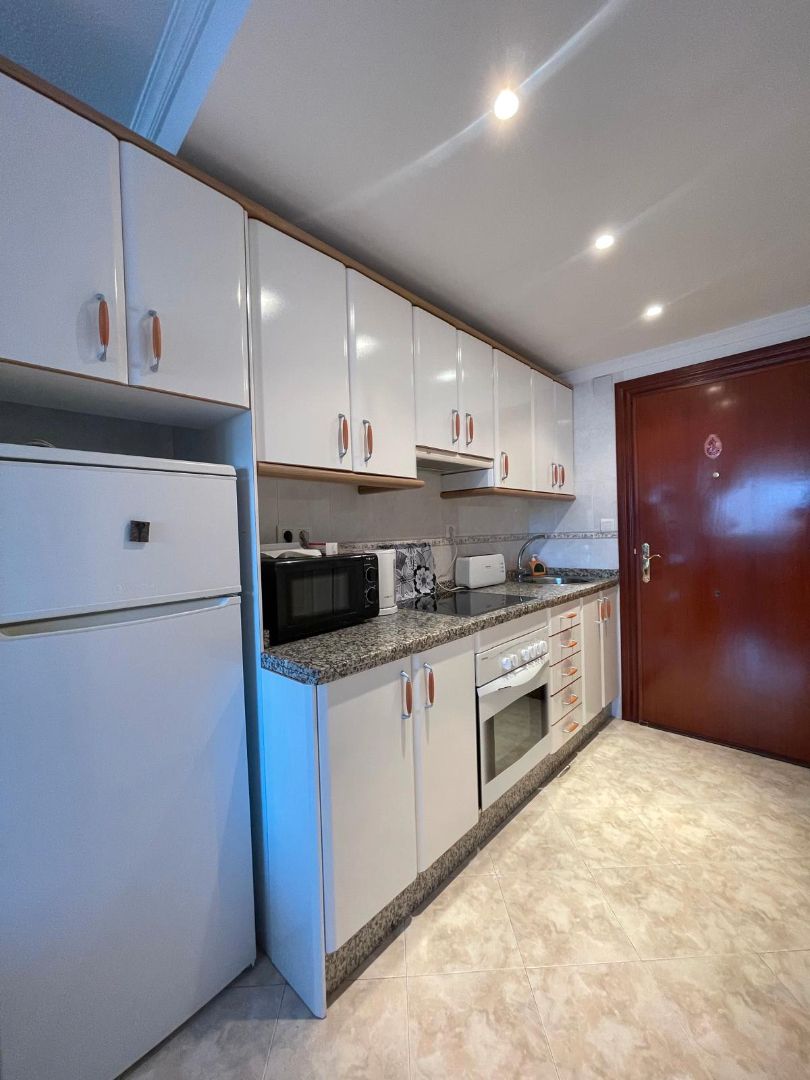 Kitchen of Flat for sale in Vélez-Málaga  with Air Conditioner, Terrace and Community pool