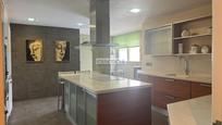 Kitchen of Flat for sale in Gandia  with Air Conditioner, Storage room and Balcony