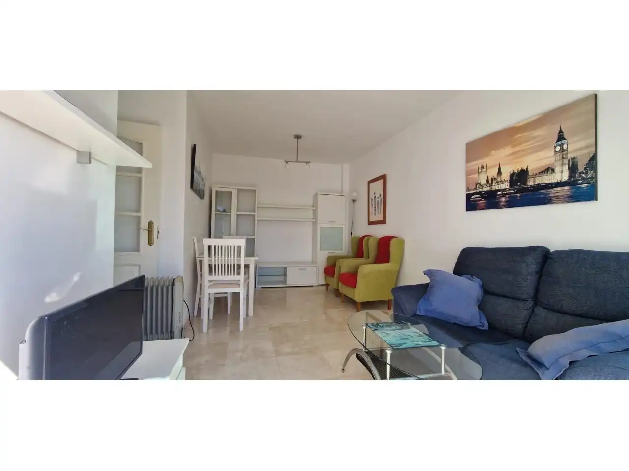 Sala d'estar de Apartament en venda en Benalmádena amb Aire condicionat, Jardí privat i Terrassa