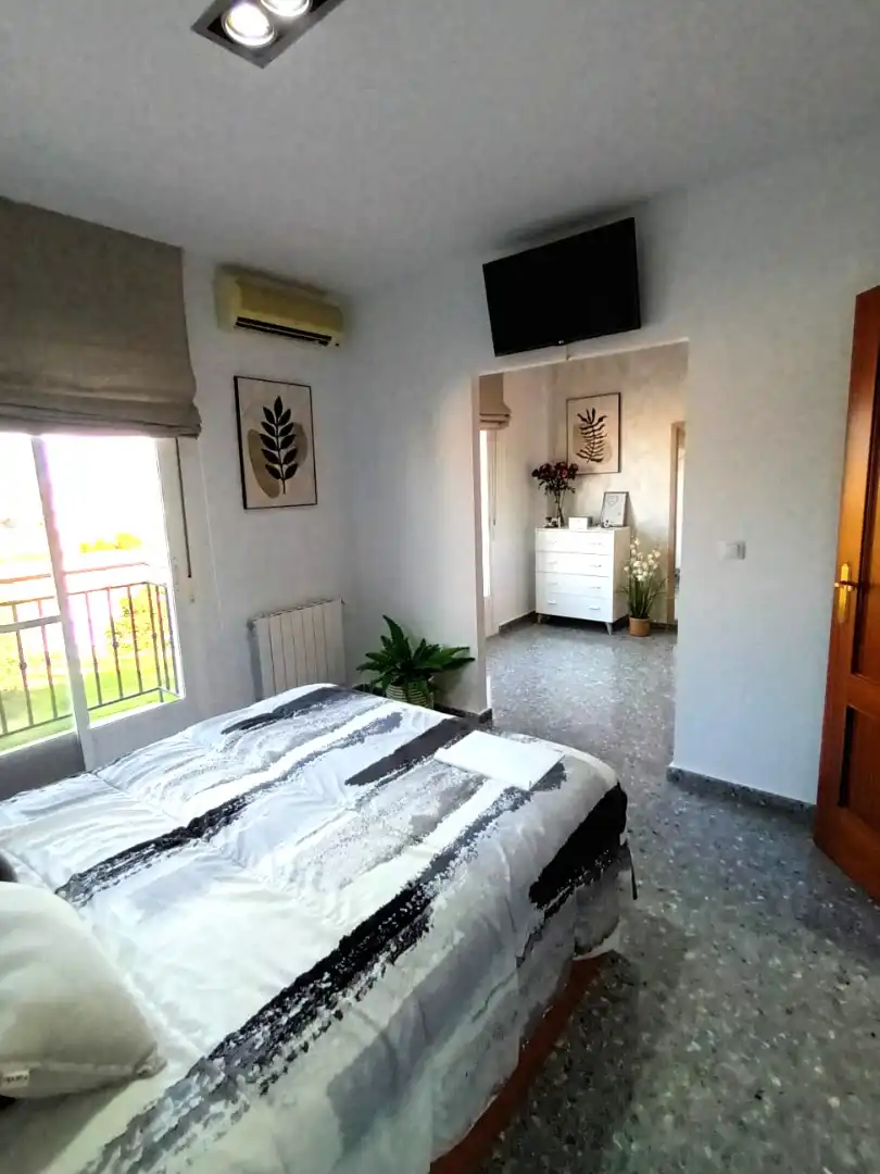 Habitación de Casa adosada en venta en Mérida con Aire acondicionado, Terraza y Trastero
