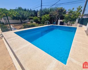 Swimming pool of House or chalet for sale in Santa Oliva  with Heating, Terrace and Storage room