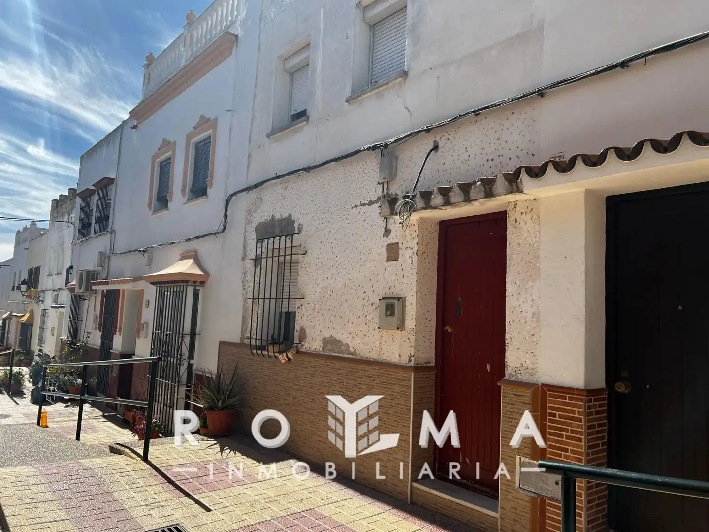 Vista exterior de Casa adosada en venta en Lebrija con Trastero