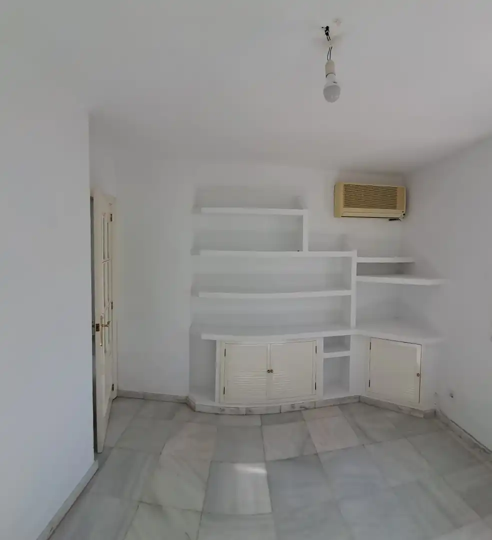 Sala d'estar de Casa adosada de lloguer en Tomares amb Aire condicionat i Piscina
