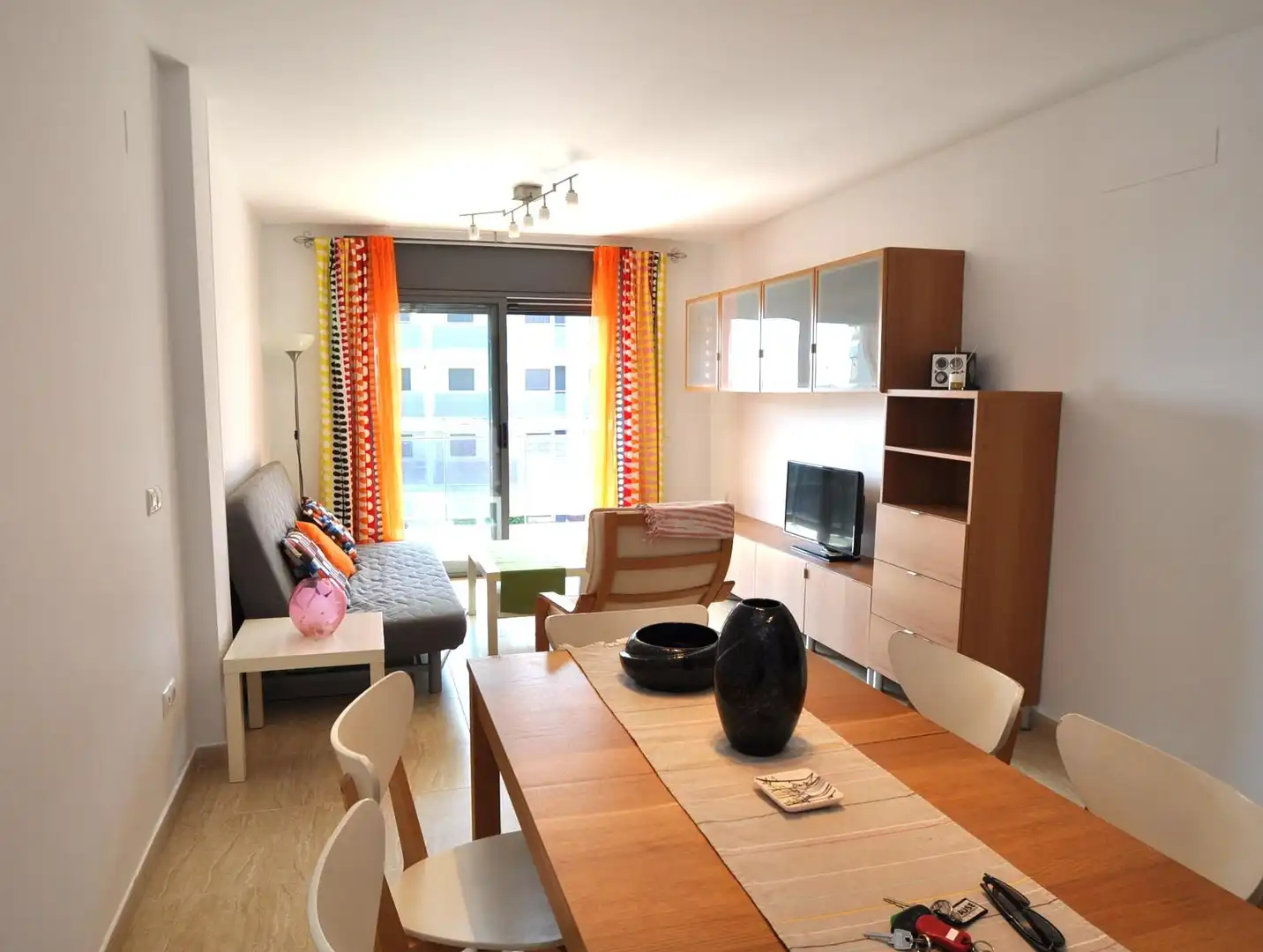 Sala de estar de Apartamento en venta en La Ràpita con Amueblado y Piscina comunitaria