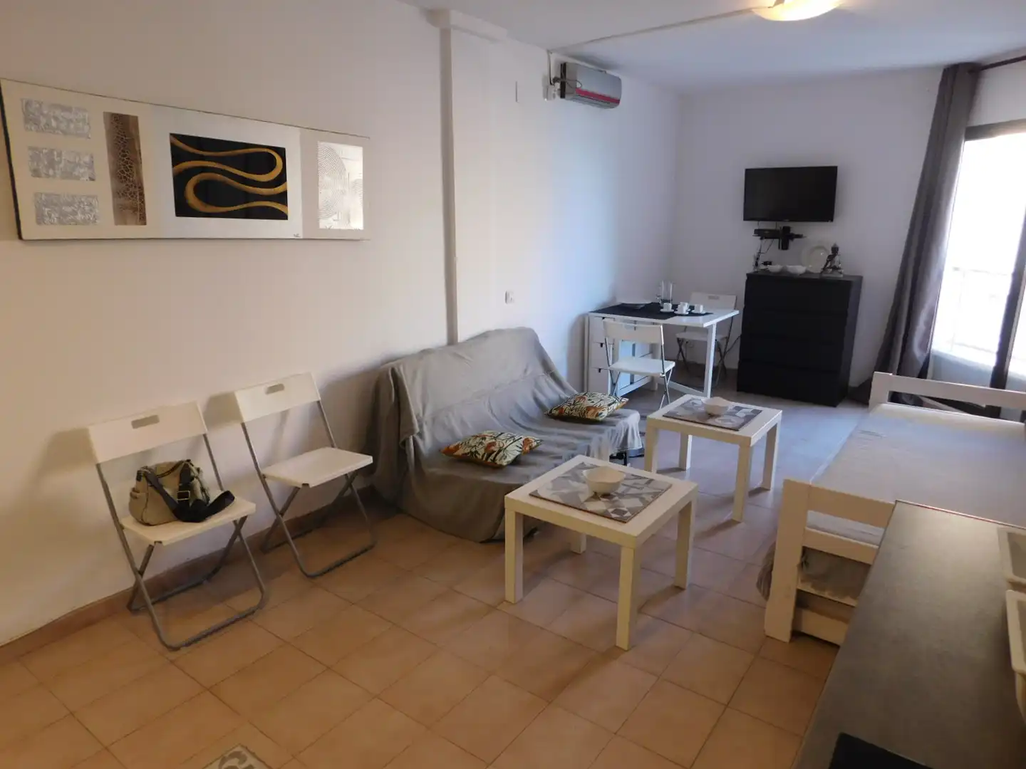 Sala de estar de Estudio de alquiler en Roses con Amueblado, Horno y Lavadora
