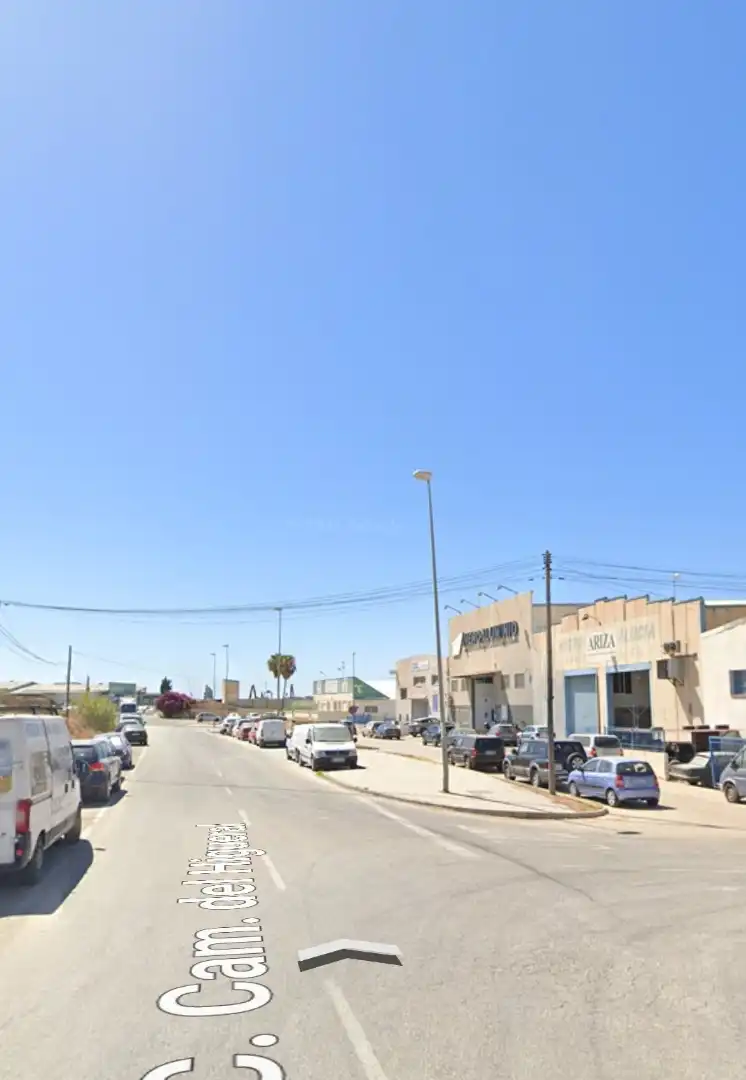 Außenansicht von Fabrikhallen zum Verkauf in Vélez-Málaga mit Heizung und Alarm
