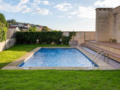 Piscina de Apartament en venda en Sanxenxo amb Calefacció, Jardí privat i Terrassa