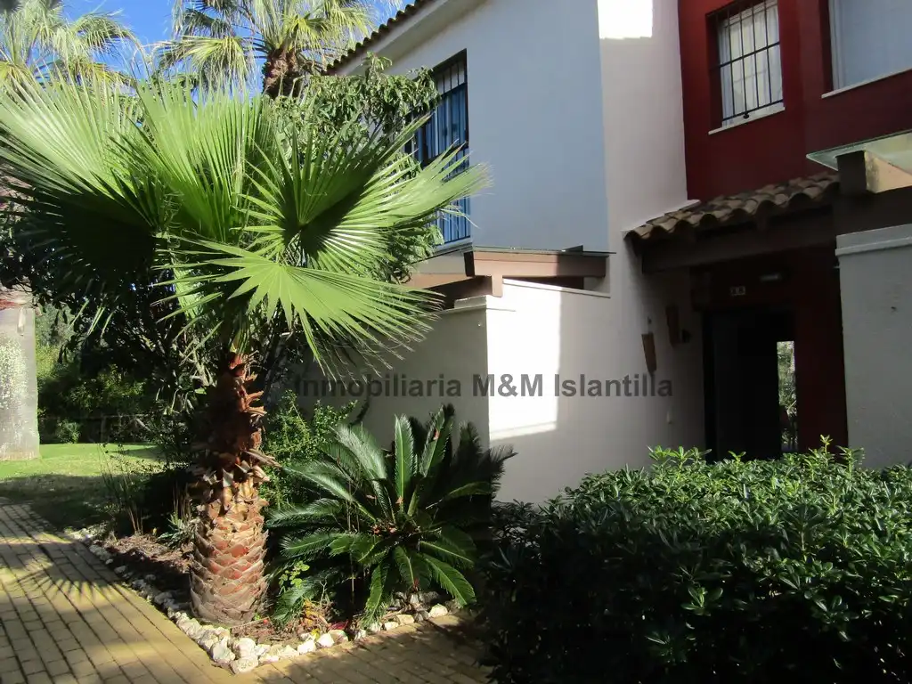 Vista exterior de Casa adosada en venta en Islantilla con Jardín privado, Terraza y Amueblado