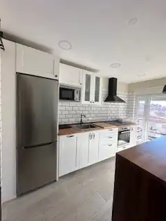 Cuina de Apartament en venda en León Capital  amb Calefacció, Parquet i Terrassa