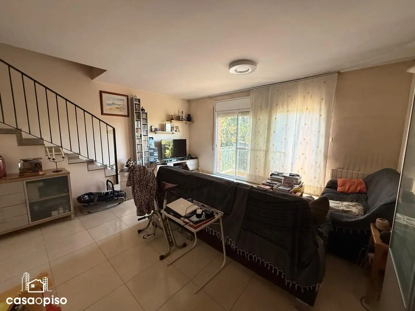 Sala de estar de Casa adosada en venta en Santa Perpètua de Mogoda con Calefacción y Terraza