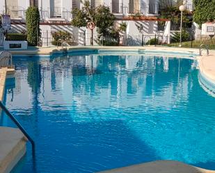 Piscina de Casa adosada de lloguer en Mojácar amb Aire condicionat, Calefacció i Jardí privat