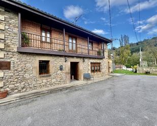 Exterior view of Single-family semi-detached for sale in Molledo  with Parquet flooring, Terrace and Furnished