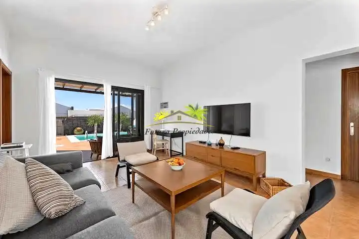 Sala de estar de Casa o chalet en venta en Yaiza con Aire acondicionado, Jardín privado y Piscina