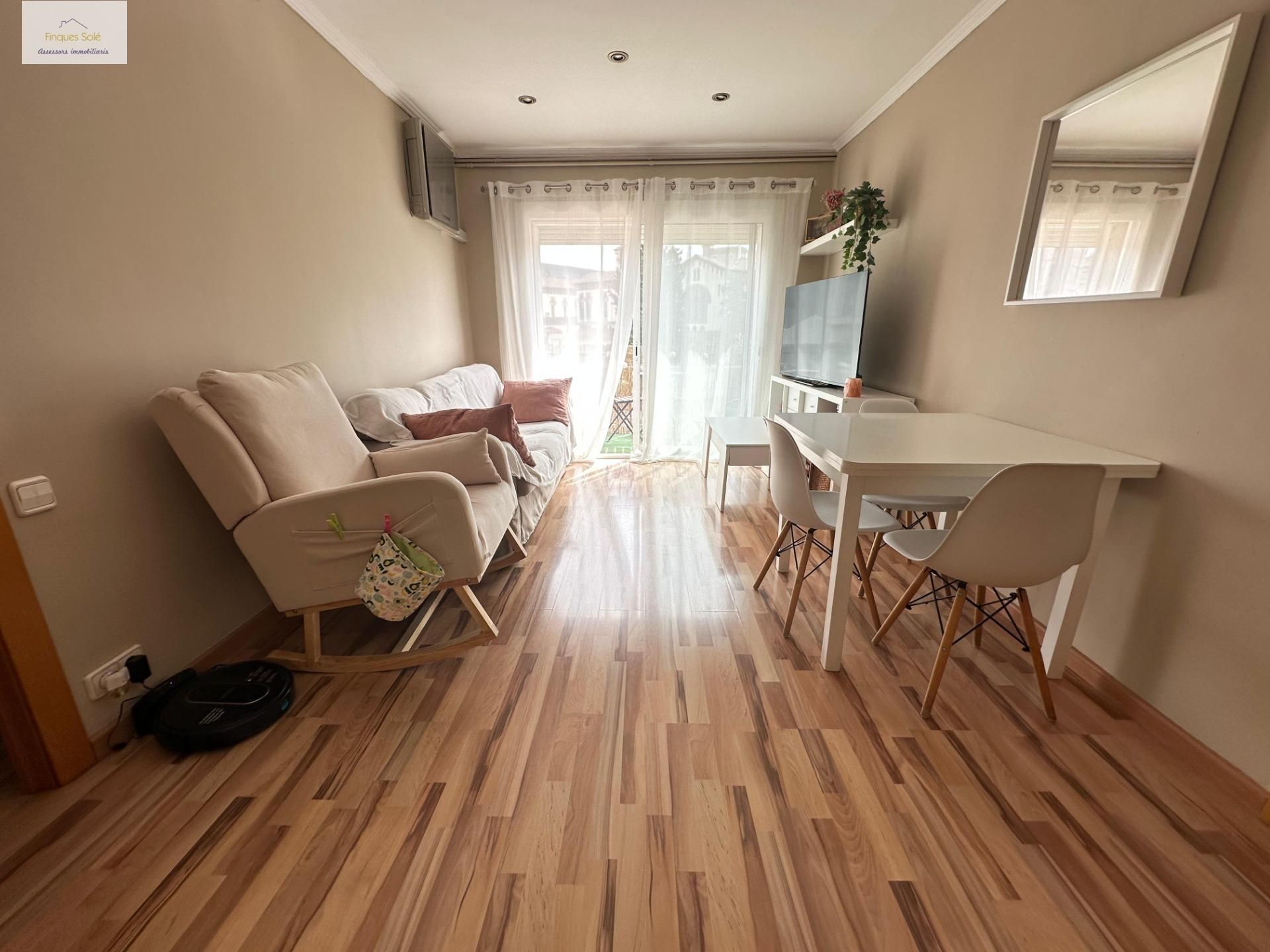 Living room of Flat for sale in Granollers  with Parquet flooring, Storage room and Balcony