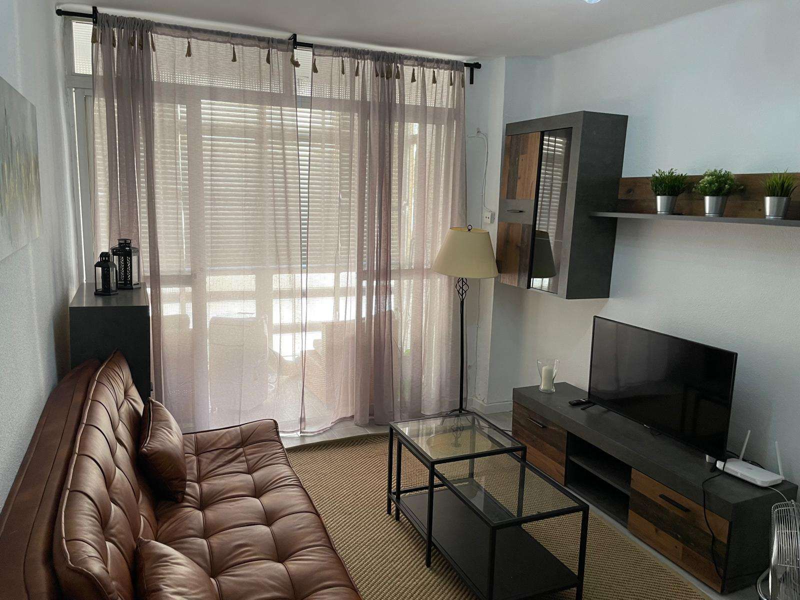 Living room of Apartment to share in Málaga Capital  with Air Conditioner, Heating and Terrace