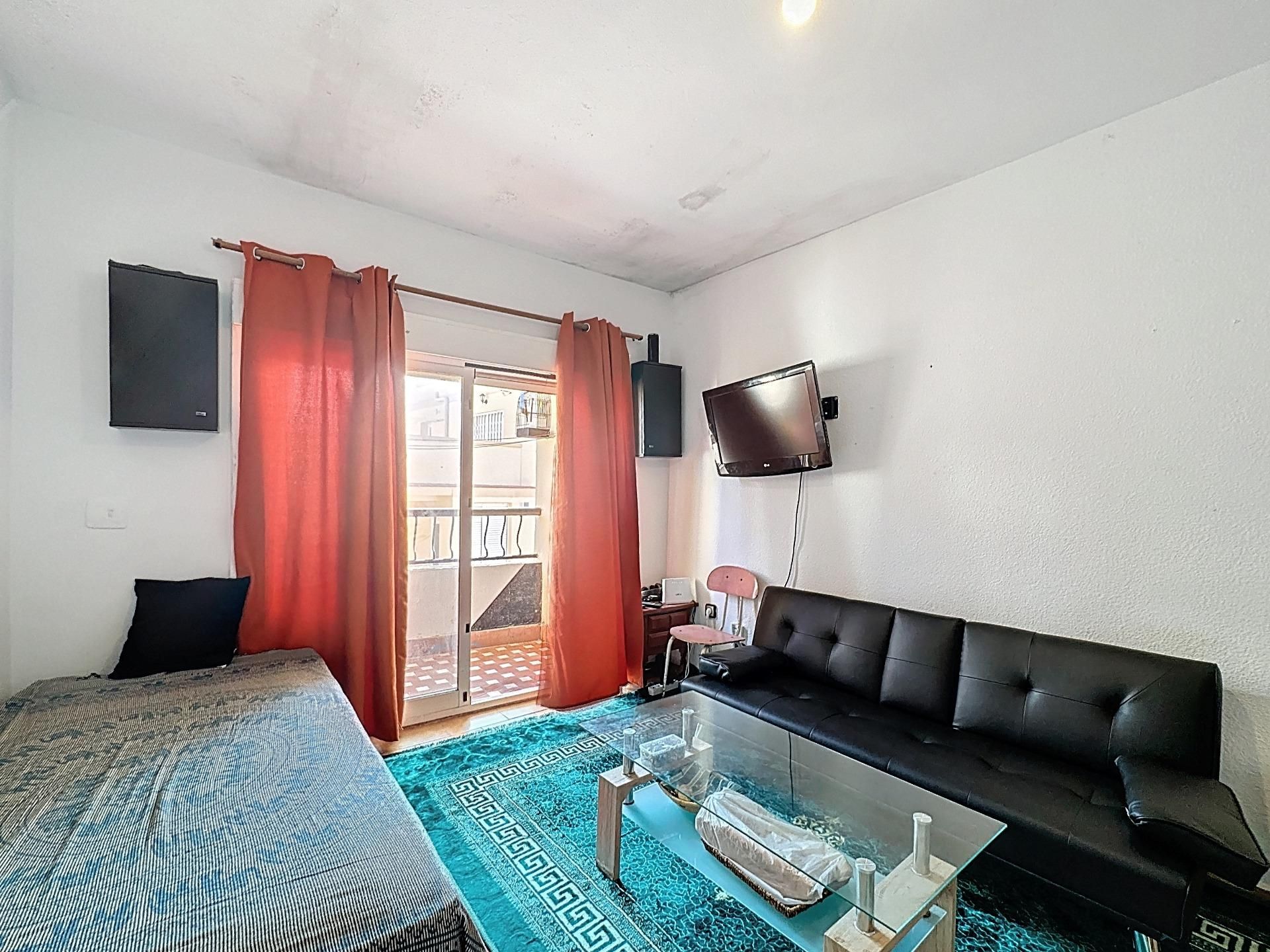 Living room of Flat for sale in Roquetas de Mar