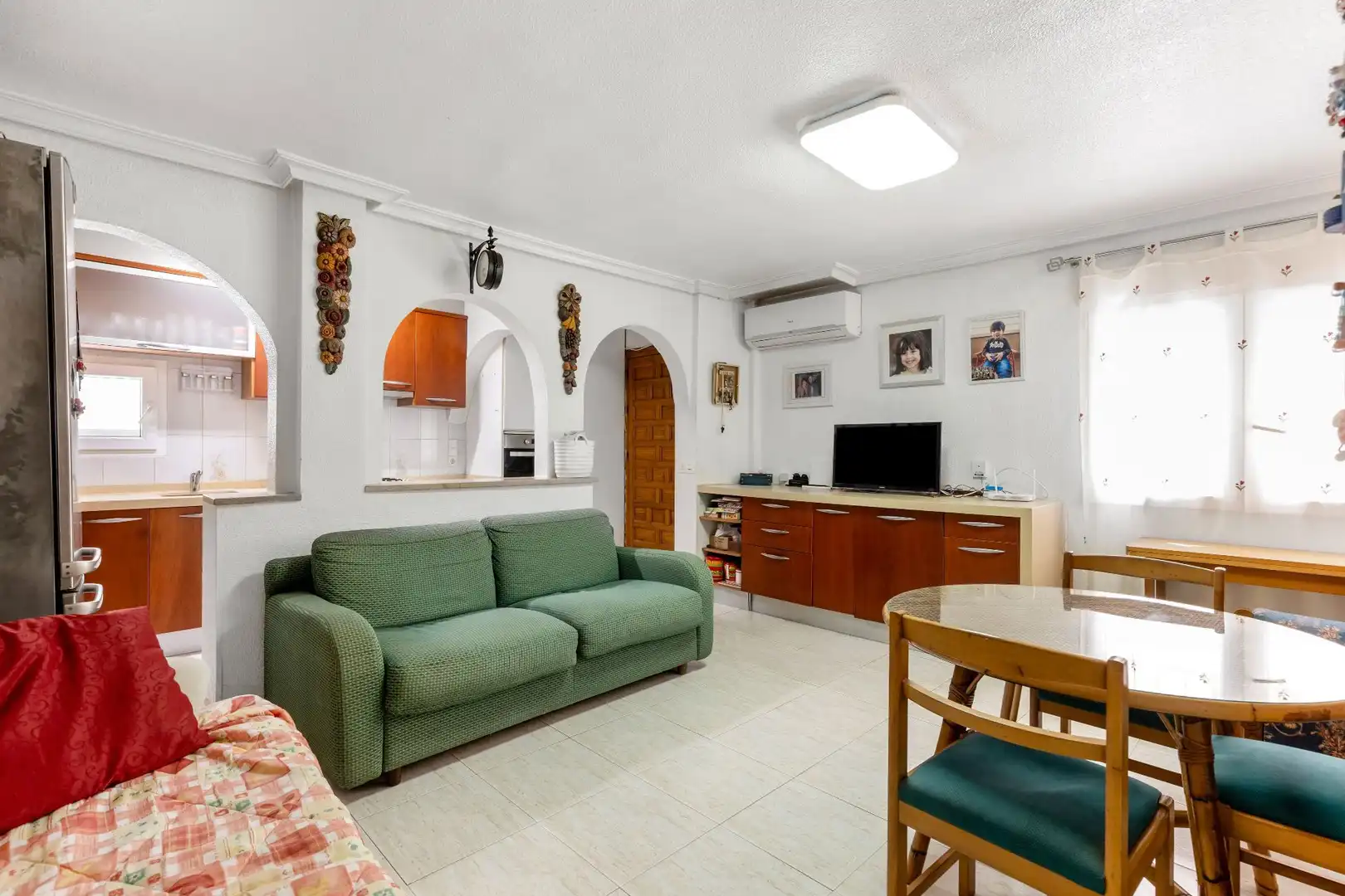 Sala de estar de Casa adosada en venta en Torrevieja con Aire acondicionado, Jardín privado y Terraza