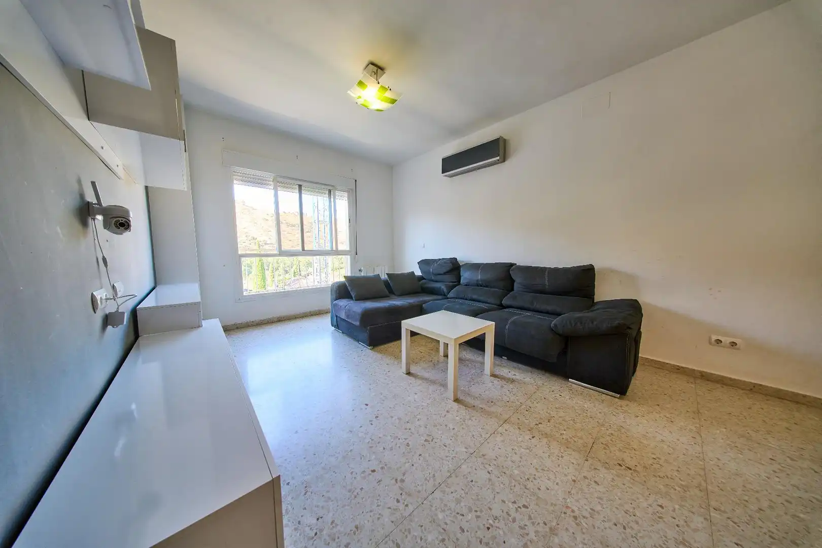 Sala de estar de Piso en venta en Granada con Aire acondicionado, Calefacción y Trastero