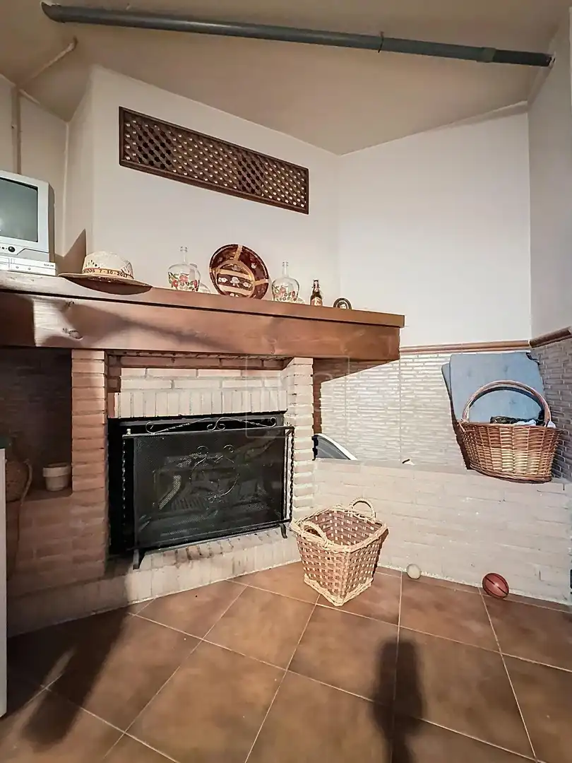 Sala de estar de Casa adosada en venta en Vegas del Genil con Aire acondicionado, Calefacción y Trastero