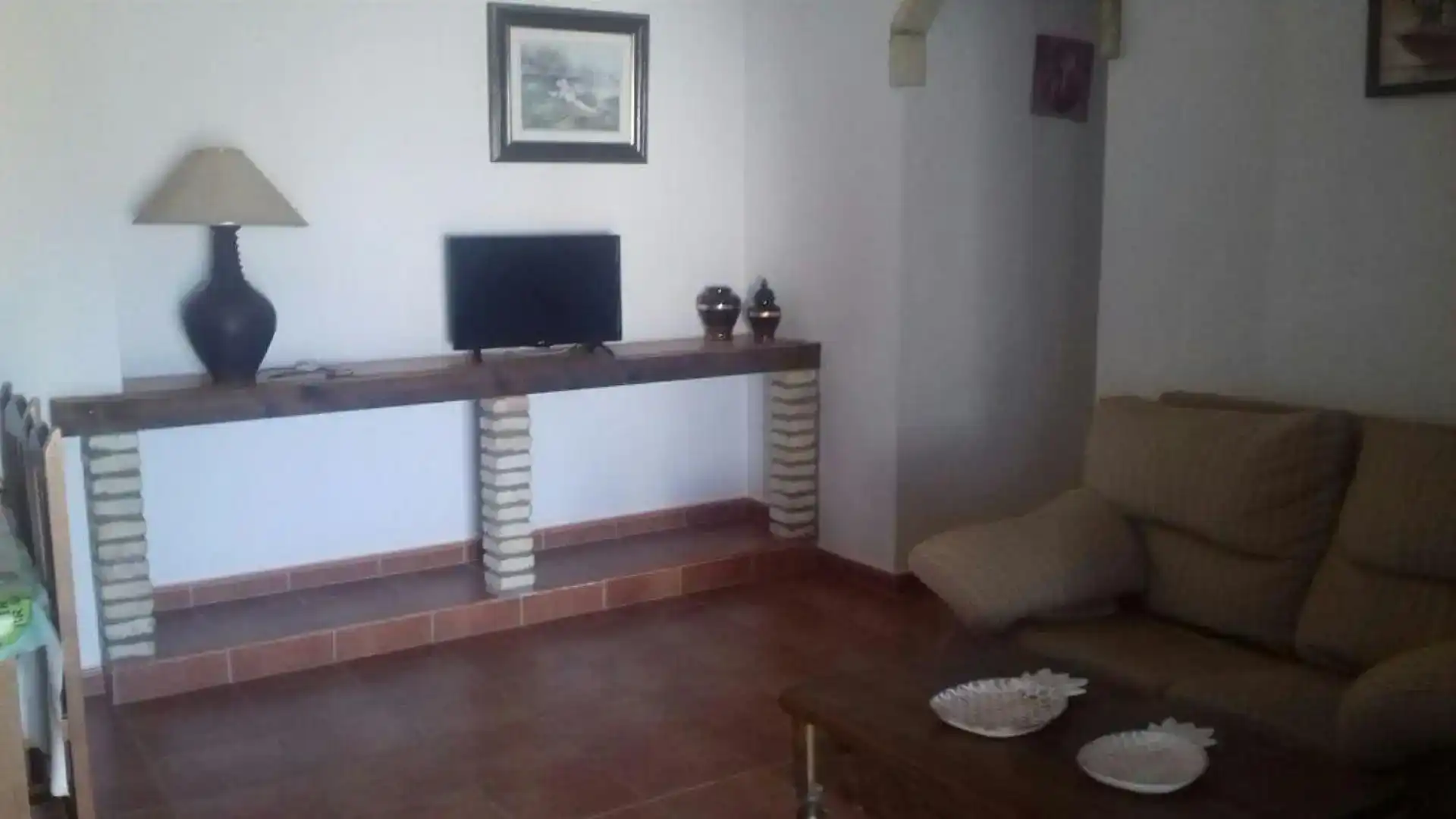 Sala d'estar de Casa adosada de lloguer en Conil de la Frontera amb Piscina