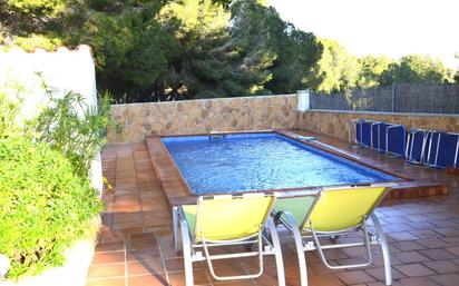 Swimming pool of House or chalet for sale in Cunit  with Air Conditioner, Heating and Private garden