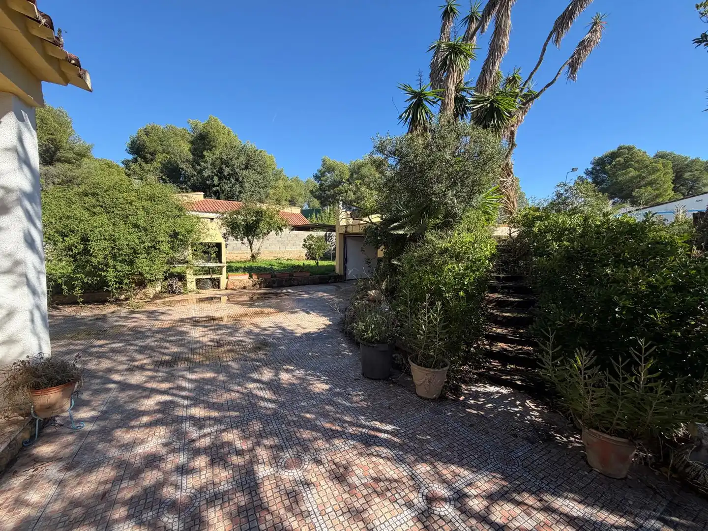 Garten von Einfamilien-Reihenhaus zum Verkauf in Olocau mit Privatgarten, Terrasse und Schwimmbad
