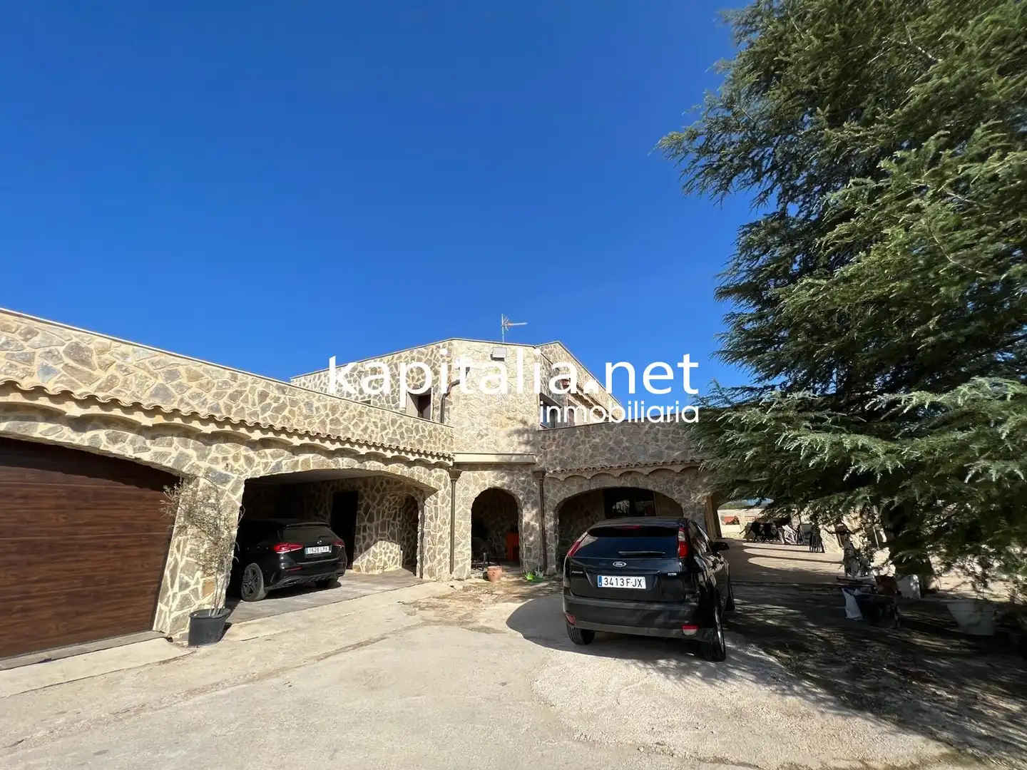Vista exterior de Casa o xalet en venda en L'Olleria amb Calefacció, Jardí privat i Terrassa